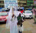 Woman Carries Placard in Streets of Nairobi in Search of Husband 