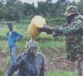 Uproar as Chief is Snapped Pouring Hot Liquid on Kenyan Granny’s Face