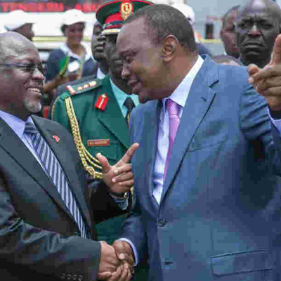President Uhuru Kenyatta speaks to his Tanzanian counterpart, John Magufuli at a past event Brookside among 20 Companies Blocked by Tanzania in Export Row