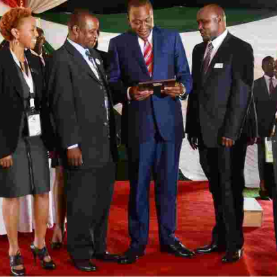Members of the Board of the Kenya USA Diaspora SACCO with President Kenyatta at a luncheon they hosted in honor of  participants  of Diaspora Conference held at Windsor Golf and country club in April, 2015.