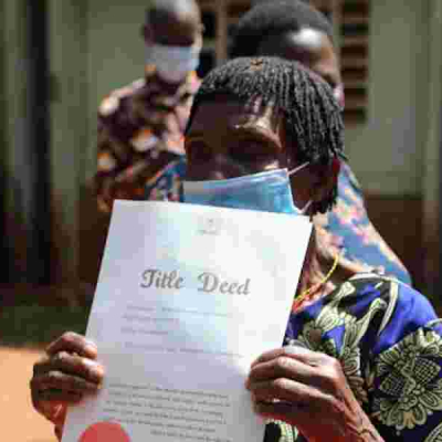 A Resident of Malindi Shows her Tittle Deed Buying Land in Kenya: Letter of Allotment vs Title Deed in Land Ownership