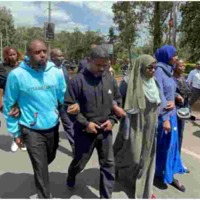 Activists Shield Boniface Mwangi from Arrest During Nairobi Protest