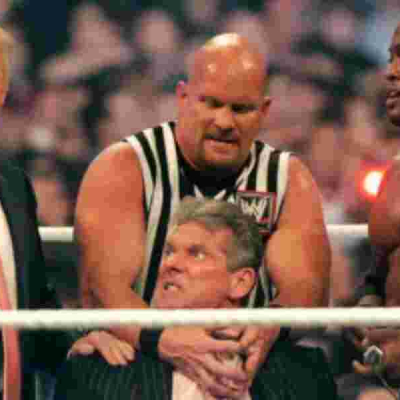 Trump's Trademark Hair was Spared After His Fighter, Bobby Lashley (right), Defeated the Wrestler Representing Vincent McMahon (bottom centre) Why Wrestling Stars are Joining Trump's Campaign Trail
