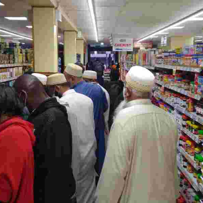 Kenyan Shopping at a Local Supermarket KNBS Report: Mixed Price Changes Hit Kenyan Consumers