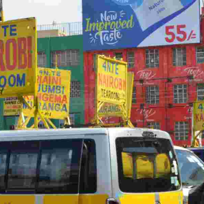 Matatus at the Main Nyeri Town bus Terminus Holiday Season Brings Contrasting Fortunes for Businesses