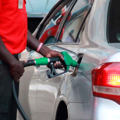 Fuel Attendant Holding a Fuel Pump EPRA Increases Fuel Prices Amid Economic Pressures