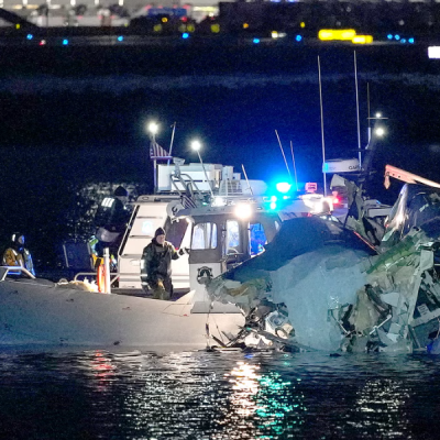 Emergency Response Units Passenger Plane Collides with Military Helicopter over Washington DC, Crashes into Potomac