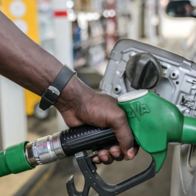 A Pump attendant  Court Dismisses Petition to Force Government Review of Fuel Prices
