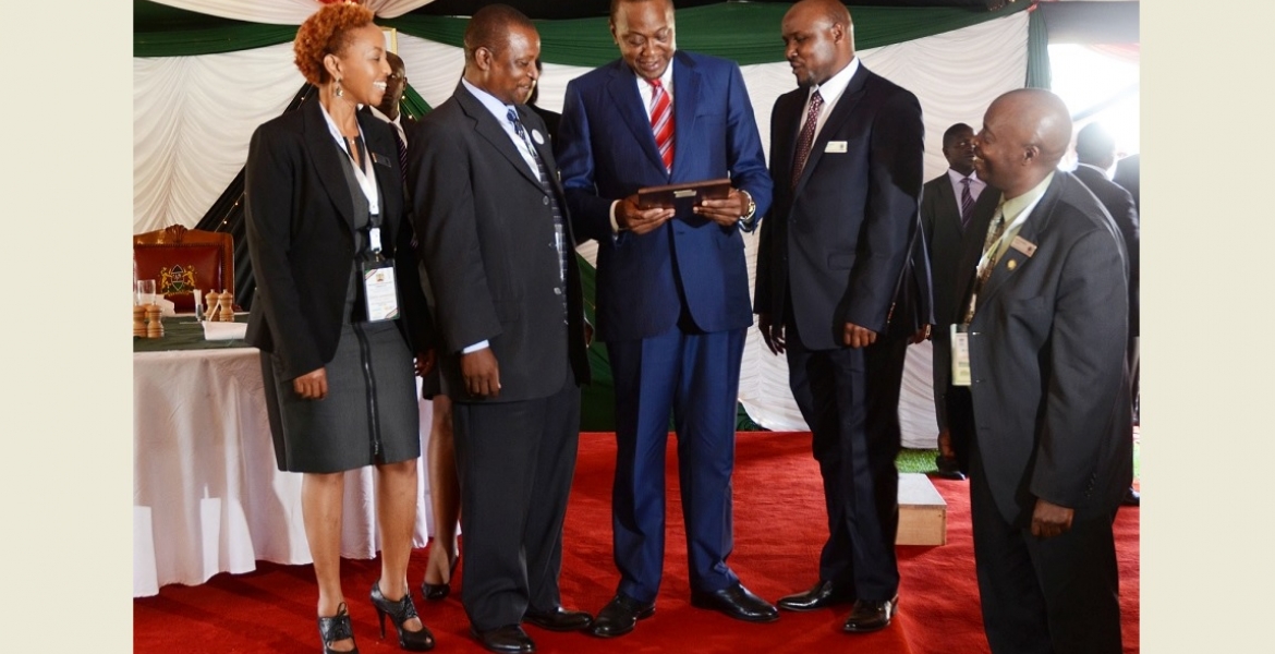 Members of the Board of the Kenya USA Diaspora SACCO with President Kenyatta at a luncheon they hosted in honor of  participants  of Diaspora Conference held at Windsor Golf and country club in April, 2015.