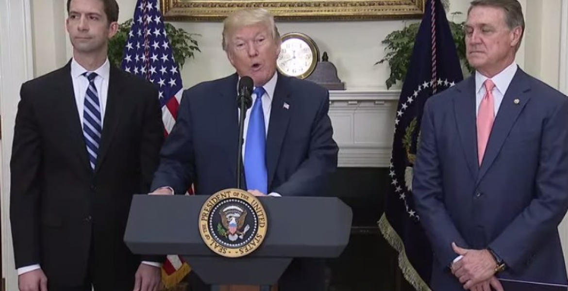 US President Donald Trump unveils the RAISE Act at the White House on Wednesday, accompanied by (left) Republican senators Tom Cotton (AR) and David Perdue (GA) US Green Card Lottery Program in Jeopardy as Donald Trump Unveils New Immigration Reform Bill, "RAISE Act"