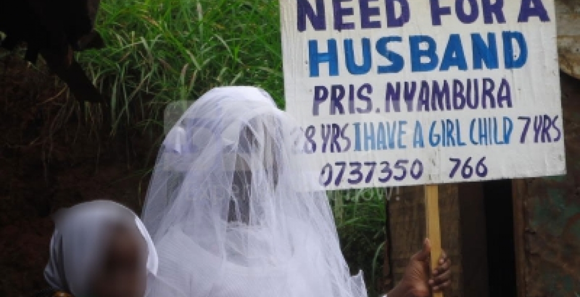 Placard-Carrying Nairobi Woman in Search of Husband Re-Unites with Father after 22 Years
