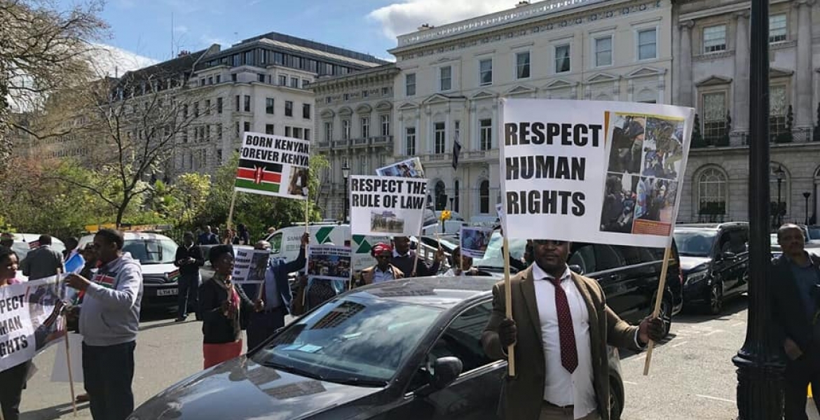 Kenyans in London Demonstrate Outside Chatham House Where President Kenyatta Delivered a Talk