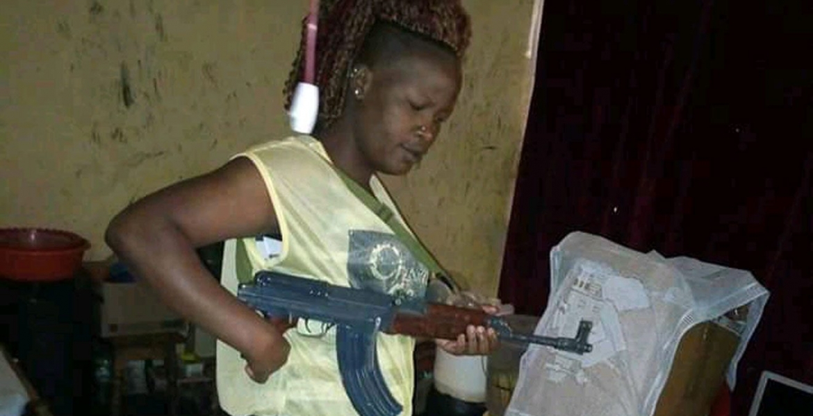Photos of Gun-Wielding Kenyan Woman Go Viral Online, Kenyans Call for Her Arrest