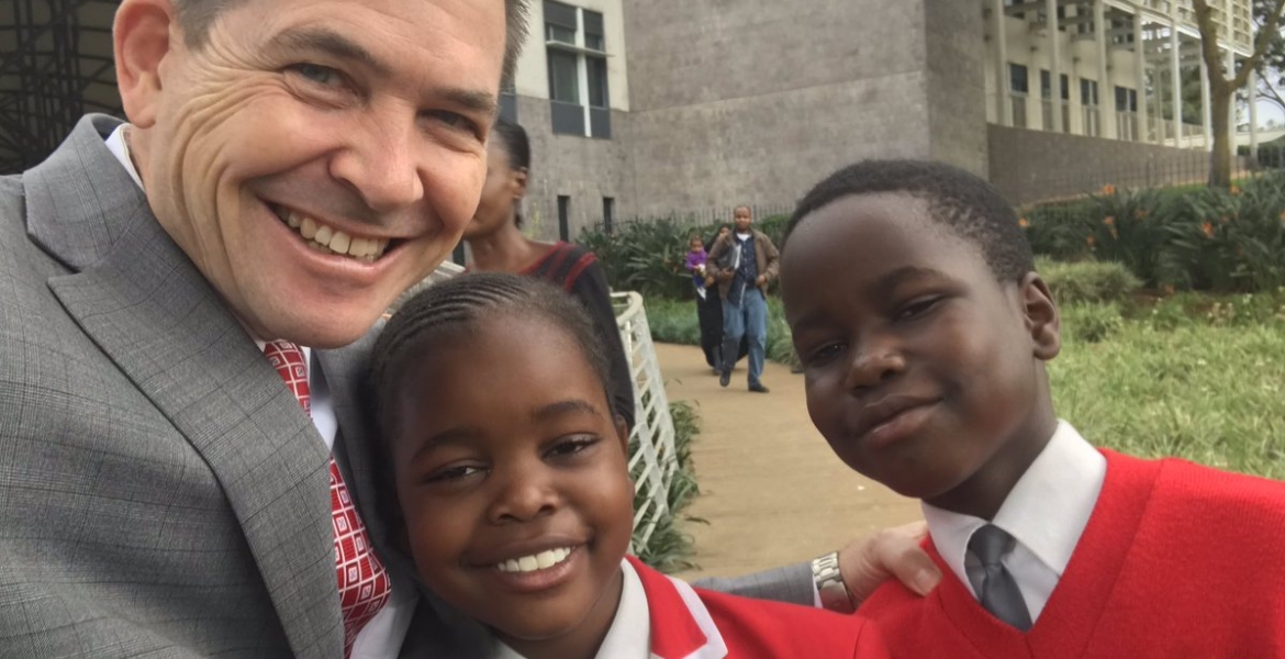 Kenyans Online Slam Ambassador Kyle McCarter for Taking Photo with Kids Who were Denied US Visas