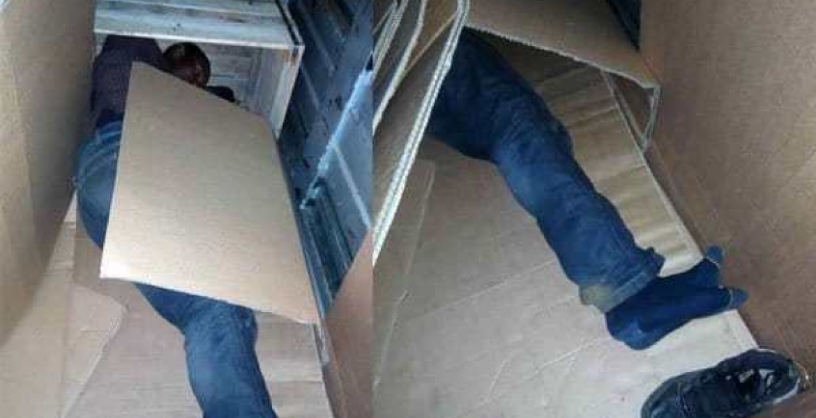 Two Kenyan Trucks Intercepted Transporting Humans in Biscuit Cartons