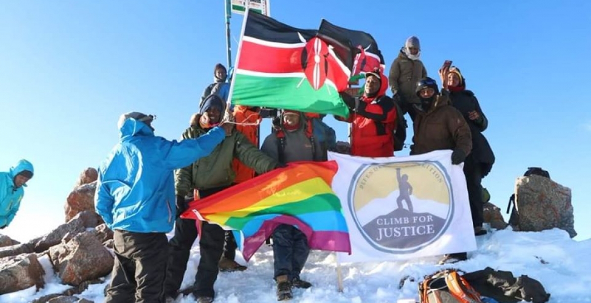 Members of Kenyan Gay Community Hoist Rainbow Flag at the Peak of Mt Kenya