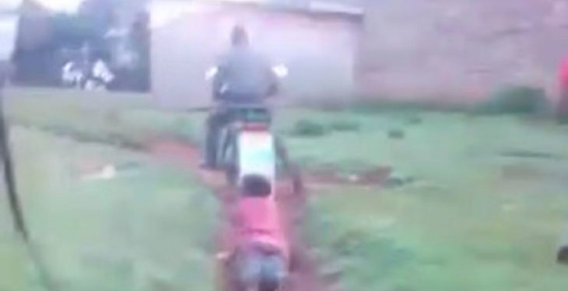 Uproar as OCS is Filmed Dragging Kenyan Woman Tied to His Motorcycle