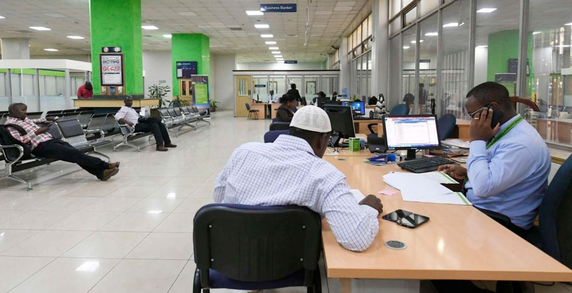 A Customer is Served at a Local Bank in Nairobi Kenyans Feel the Pinch as Banks Raise Interest Rates
