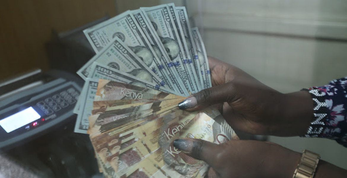 A Cashier at a Nairobi Forex Bureau Counts Dollars and Shilling Notes The Kenyan Shilling Gains Strength Against the US Dollar
