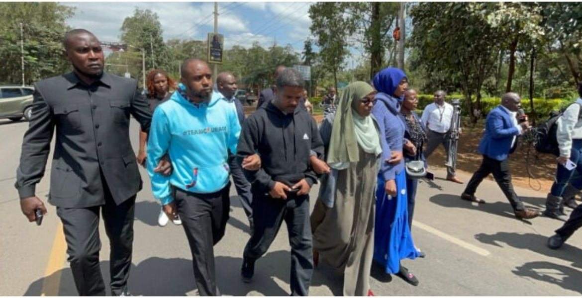 Activists Shield Boniface Mwangi from Arrest During Nairobi Protest