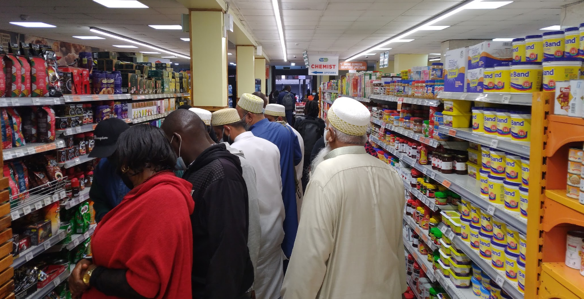 Kenyan Shopping at a Local Supermarket KNBS Report: Mixed Price Changes Hit Kenyan Consumers