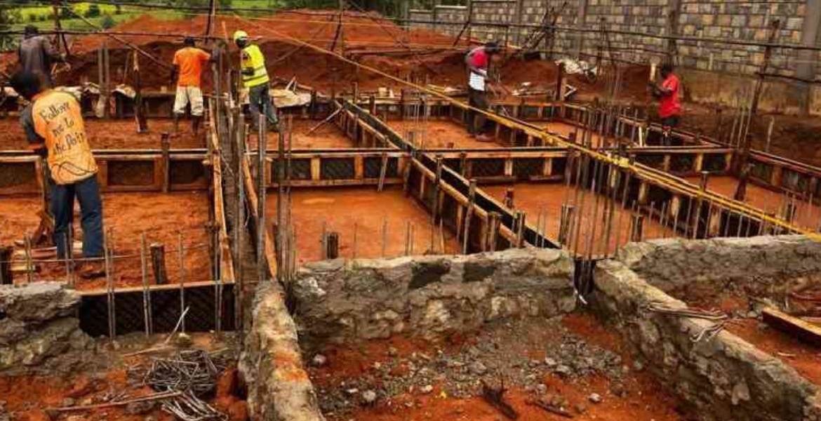 Workers at a Construction Site Construction Sector Dominates Economic Activity in Kenya's Drylands, KIPPRA Report Reveals
