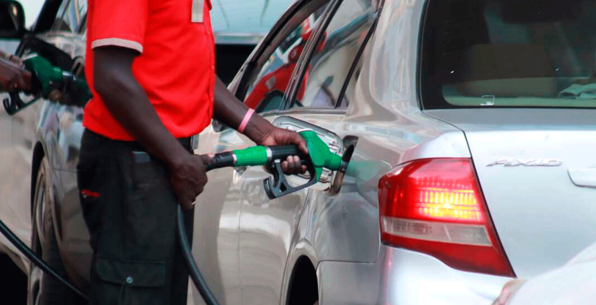 Fuel Attendant Holding a Fuel Pump EPRA Increases Fuel Prices Amid Economic Pressures