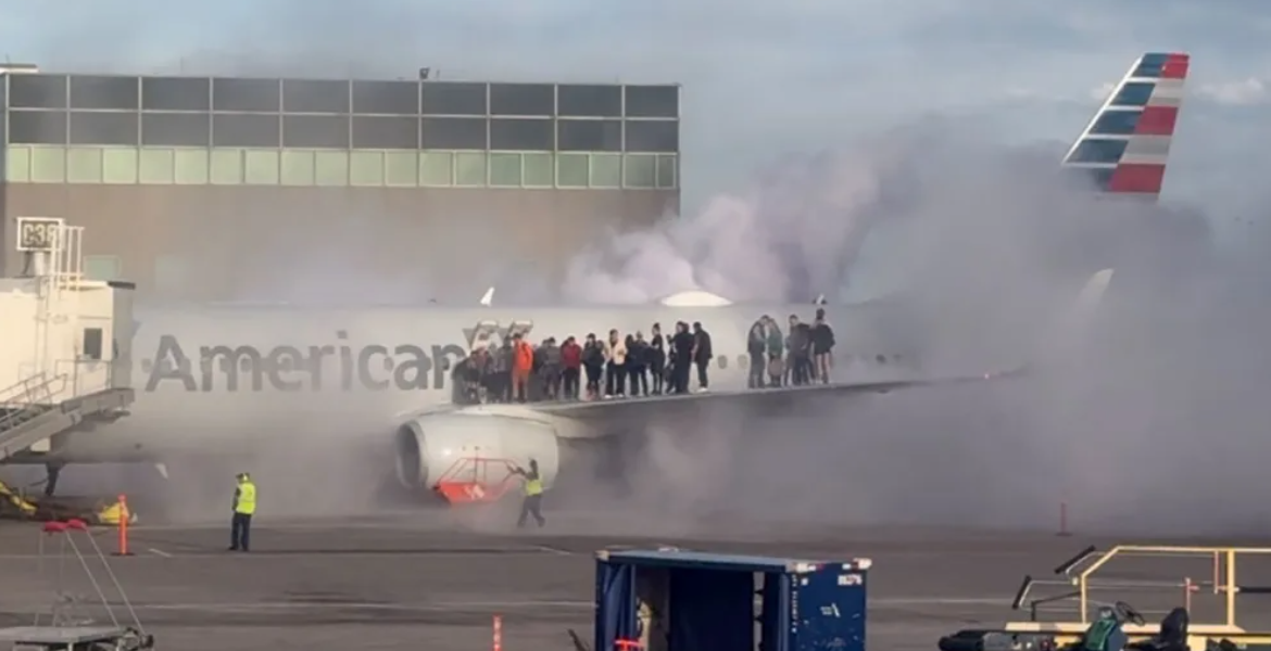 Airplane Passengers American Airlines Passengers Evacuated via Wing After Engine Fire at Denver Airport