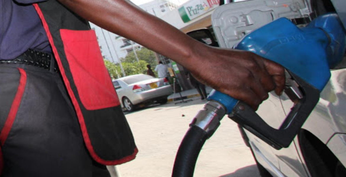 Fuel Attendant Holding a Fuel Pump Petrol Users Pay More in Taxes Than Product Cost