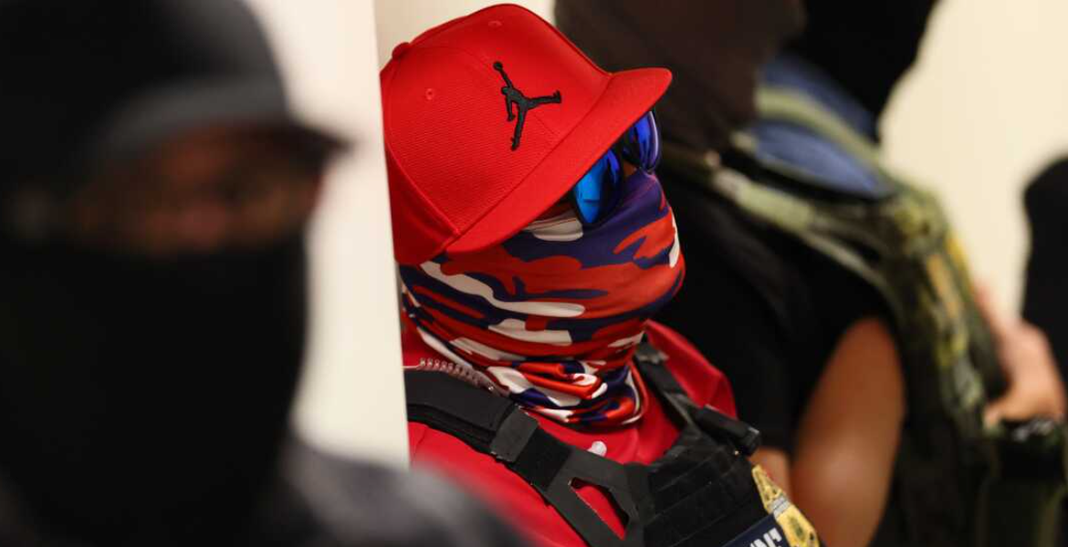 Masked Immigration Agent Masked Immigration Agents Fuel Public Fear and Confusion Across the US